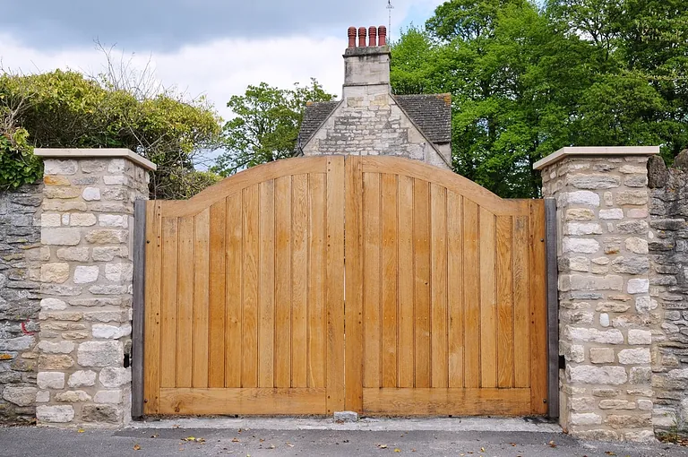 Wooden gate front enterance to a house